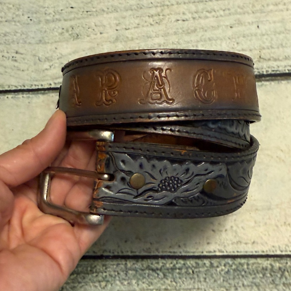 Vintage Leegin USA leather tooled belt “Apache” on back
Of belt. 34